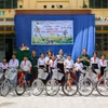 10 chiếc xe đạp được trao cho học sinh có hoàn cảnh khó khăn trên địa bàn xã Tân Bình, huyện Tân Biên, tỉnh Tây Ninh. (Ảnh: Giang Phương/TTXVN)