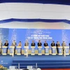 Các đại biểu thực hiện nghi thức công bố triển khai Dự án Thành phố Thông minh. (Ảnh: Mạnh Khánh/TTXVN)