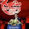 Bộ trưởng Bộ Ngoại giao Bùi Thanh Sơn phát biểu khai mạc Chương trình Xuân quê hương 2022. (Ảnh: Lâm Khánh/TTXVN)