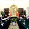Thứ trưởng Bộ Ngoại giao Hà Kim Ngọc cùng Thứ trưởng Bộ Các Vấn đề Toàn cầu Canada David Morrison đồng chủ trì Tham khảo Chính trị Việt Nam-Canada. (Nguồn: Bộ Ngoại giao)