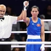 Tối 27/7 (giờ Việt Nam), trong trận đấu ra quân ở vòng loại môn Boxing hạng cân 60kg nữ của Olympic Paris 2024, võ sỹ Hà Thị Linh của Việt Nam đã giành chiến thắng với tỷ số áp đảo 5-0 trước đối thủ Feofaaki Epenisa đến từ Tonga. (Ảnh: Hoàng Linh/TTXVN)