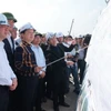 Phó Thủ tướng Trần Hồng Hà kiểm tra Dự án đường bộ cao tốc Bắc-Nam phía Đông đoạn Diễn Châu-Bãi Vọt. (Ảnh: Dương Giang/TTXVN)