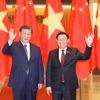 Chủ tịch Quốc hội Vương Đình Huệ và Tổng Bí thư, Chủ tịch nước Trung Quốc Tập Cận Bình chụp ảnh chung. (Ảnh: Doãn Tấn/TTXVN)