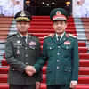 Bộ trưởng Quốc phòng Phan Văn Giang và Phó Thủ tướng, Bộ trưởng Bộ Quốc phòng Campuchia Tea Seihatại Lễ đón. (Ảnh: An Đăng/TTXVN)