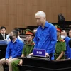 Bị cáo Trần Văn Tám - cựu Tổng Giám đốc Tổng Công ty Đầu tư Phát triển Đường Cao tốc Việt Nam (VEC), cựu Chủ tịch Hội đồng Nghiệm thu cơ sở. (Ảnh: Phạm Kiên/TTXVN)