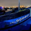 Tàu cá bị cháy mang số hiệu ĐNa 90082 TS. (Ảnh: TTXVN phát)