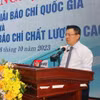 Ông Lê Quốc Minh, Ủy viên Ban Chấp hành Trung ương Đảng, Phó trưởng Ban Tuyên giáo Trung ương, Tổng Biên tập Báo Nhân Dân, Chủ tịch Hội Nhà báo Việt Nam, phát biểu tại Hội nghị. (Ảnh: Hữu Chí/TTXVN)