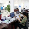 Giải quyết thủ tục hành chính. (Ảnh minh họa. Nguồn: TTXVN)