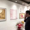 Triển lãm giới thiệu 32 tác phẩm của 11 họa sỹ về chủ đề mùa Giáng sinh. (Ảnh: Minh Thu/Vietnam+)