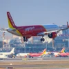 Máy bay của Hãng hàng không Vietjet Air hạ cánh tại Sân bay Tân Sơn Nhất. (Ảnh: PV/Vietnam+)