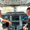 Vũ Mai Khanh hiện đang là Lái phụ bay bằng máy bay Airbus A350 (Đoàn bay 919 - Vietnam Airlines). (Ảnh: Việt Hùng/Vietnam+)