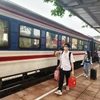 Nhiều hành khách đã chọn đường sắt làm phương tiện trải nghiệm du lịch trên dọc hành trình đất nước. (Ảnh: Việt Hùng/Vietnam+)
