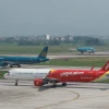 Máy bay của các hãng hàng không Việt Nam tại một sân bay nội địa. (Ảnh: Việt Hùng/Vietnam+)