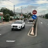 Phương tiện lưu thông trên một đoạn tuyến quốc lộ tại khu vực Đồng bằng sông Cửu Long. (Ảnh: Việt Hùng/Vietnam+)