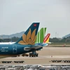 Doanh thu của các hãng hàng không có khởi sắc nhưng các chi phí đầu vào tăng mạnh hơn khiến lợi nhuận tăng không tương xứng và chưa thể kéo giảm lỗ. (Ảnh: PV/Vietnam+)