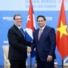 Thủ tướng Phạm Minh Chính tiếp Bộ trưởng Ngoại giao Cuba Bruno Rodriguez Parrilla. (Ảnh: Dương Giang/TTXVN)