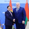 Thủ tướng Phạm Minh Chính gặp Tổng thống Belarus Alexander Lukashenko. (Ảnh: Dương Giang/TTXVN)