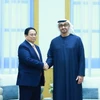 Thủ tướng Phạm Minh Chính hội đàm với Tổng thống Các Tiểu Vương quốc Arab Thống nhất (UAE) Mohamed bin Zayed Al Nahyan. (Ảnh: Dương Giang/TTXVN)