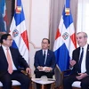 Thủ tướng Phạm Minh Chính gặp hẹp Tổng thống Dominicana Luis Abinader Corona trước hội đàm chính thức. (Ảnh: Dương Giang/TTXVN)