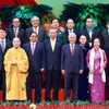 Lãnh đạo Đảng, Nhà nước chụp ảnh chung với các đại biểu. (Ảnh: TTXVN)