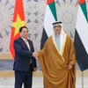 Phó Tổng thống UAE Sheikh Mansour Bin Zayed Al Nahyan chủ trì Lễ đón Thủ tướng Phạm Minh Chính thăm chính thức Các Tiểu Vương quốc Arab Thống nhất (UAE). (Ảnh: Dương Giang/TTXVN)