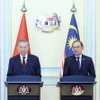 Tổng Bí thư Tô Lâm và Thủ tướng Malaysia Anwar Ibrahim phát biểu với báo chí. (Ảnh: Thống Nhất/TTXVN)