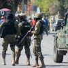 Cảnh sát siết chặt an ninh tại Port-au-Prince, Haiti. (Ảnh: AFP/TTXVN)