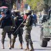 Cảnh sát siết chặt an ninh tại Port-au-Prince, Haiti. (Ảnh: AFP/TTXVN)