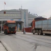 Phương tiện chở hàng thông quan qua luồng xuất nhập khẩu tại cửa khẩu Chi Ma (Lạng Sơn). (Ảnh: Quang Duy/TTXVN)