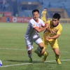 Đội khách Hải Phòng (áo trắng) cầm hòa Hà Nội FC với tỷ số 2-2 ở vòng 7 V-League 2024-2025. (Ảnh: Việt Anh/Vietnam+)