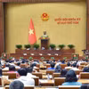 Quốc hội thông qua Luật Đấu thầu (sửa đổi).( Ảnh: Doãn Tấn/TTXVN)