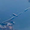 Hiện trường vụ sập cầu Francis Scott Key ở thành phố Baltimore, bang Maryland (Mỹ), sau khi bị tàu chở hàng đâm trúng, ngày 31/3/2024. (Ảnh: AFP/TTXVN)