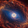 Thiên hà xoắn ốc NGC 1512, nằm cách Trái Đất 30 triệu năm ánh sáng, được nhìn thấy trong một hình ảnh từ Kính viễn vọng Không gian James Webb. (Ảnh: NASA)