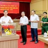 Bí thư Tỉnh ủy Dương Văn An cùng các đại biểu bỏ phiếu bầu chức danh Phó Bí thư Tỉnh ủy. (Nguồn: Báo Vĩnh Phúc)