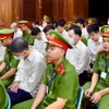 Các bị cáo tại phiên tòa. (Ảnh: Hồng Giang/TTXVN)