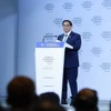 Thủ tướng Phạm Minh Chính phát biểu tại Phiên toàn thể Hội nghị thường niên các nhà tiên phong lần thứ 15 của WEF. (Ảnh: Dương Giang/TTXVN)