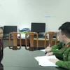 Đối tượng Nguyễn Thị Phương tại cơ quan công an. (Ảnh: TTXVN phát)