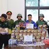 Đối tượng Lê Hữu Lam cùng tang vật bị lực lượng chức năng bắt giữ. (Nguồn: Báo Hà Tĩnh)
