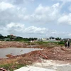 Khu vực dự án tái định cư nơi hai cháu nhỏ bị đuối nước. (Ảnh: TTXVN phát)