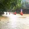 Cán bộ, chiến sỹ Bộ Chỉ huy Quân sự tỉnh Hà Giang giúp nhân dân khắc phục ngập úng. (Ảnh: Thế Đồng/TTXVN phát)