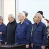 Sáu trong số chín bị cáo có mặt tại phiên tòa xét xử. (Ảnh: Tiên Minh/TTXVN)