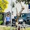 Lực lượng công an khám xét nơi ở của ông Huỳnh Lê Phong, nguyên Trưởng phòng Tài nguyên và Môi trường thành phố Long Xuyên. (Nguồn: Báo An Giang)