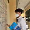 Thí sinh chuẩn bị vào phòng thi tại Trường Đại học Khoa học Tự nhiên, Đại học Quốc gia Thành phố Hồ Chí Minh. (Ảnh: Thu Hoài/TTXVN)