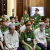 Các bị cáo tại phiên tòa. (Ảnh: Hồng Giang/TTXVN)