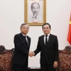 Phó Thủ tướng Trần Lưu Quang tiếp Phó Thủ tướng Singapore Gan Kim Yong. (Ảnh: Lâm Khánh/TTXVN)