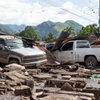 Các phương tiện bị phá hủy khi bão Beryl quét qua. (Nguồn: AFP/TTXVN)