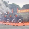 Nghi thức bắn 21 loạt đại bác chào mừng Tổng Bí thư, Chủ tịch nước Lào Thongloun Sisoulith và Phu nhân thăm cấp Nhà nước đến Việt Nam. (Ảnh: Huy Hùng/TTXVN)