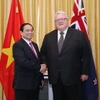 Thủ tướng Phạm Minh Chính hội kiến Chủ tịch Quốc hội New Zealand Gerry Brownlee. (Ảnh: Dương Giang/TTXVN)