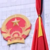 Ủy ban Nhân dân thành phố Hà Nội treo cờ rủ tưởng nhớ Tổng Bí thư Nguyễn Phú Trọng. (Ảnh: Văn Điệp/TTXVN)