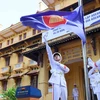 Lực lượng tiêu binh thực hiện nghi thức thượng cờ ASEAN.(Ảnh: An Đăng/TTXVN)